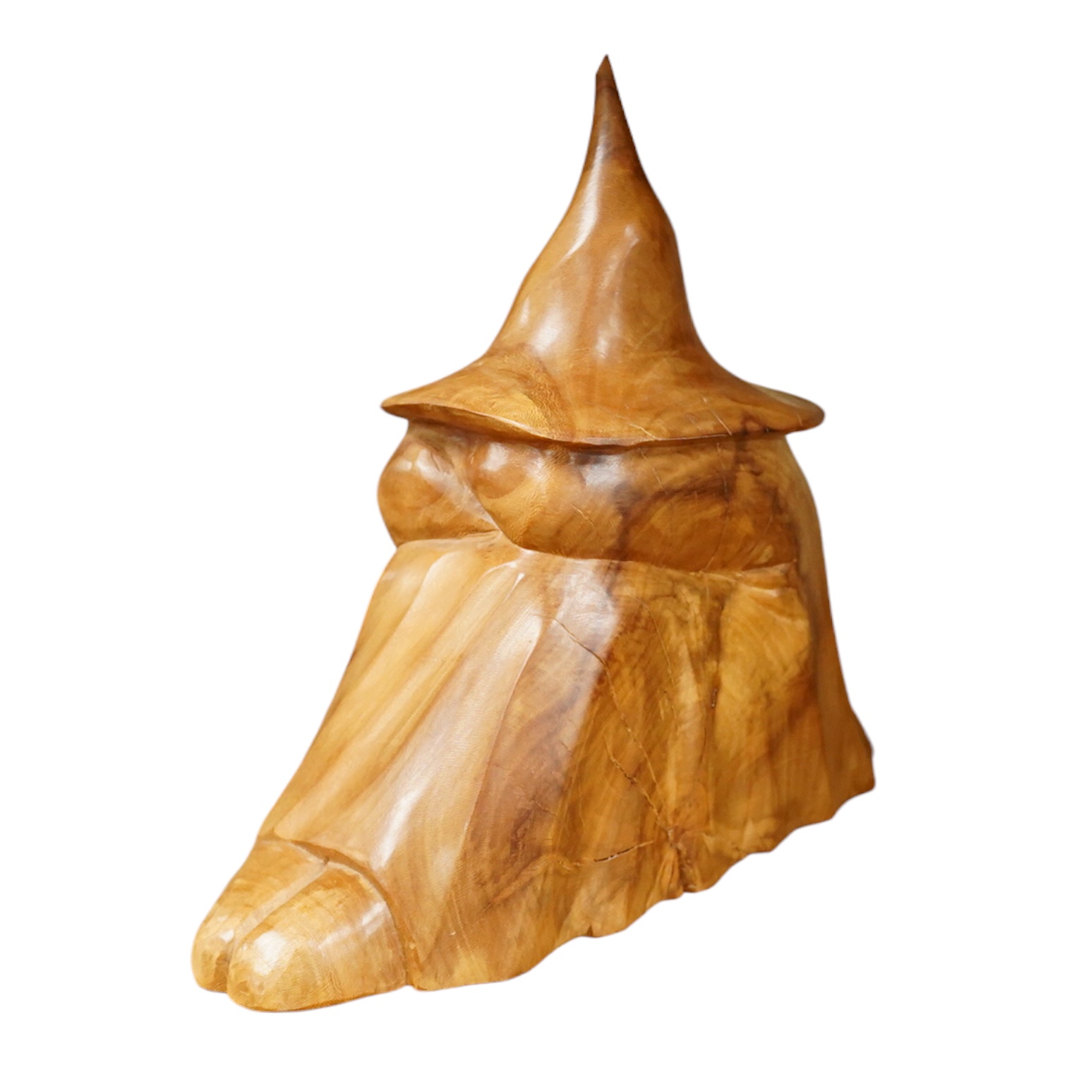 Pierre Decorse (b.1953), a naturalistically modelled wooden sculpture depicting a crouched figure obscured by a large hat 25cm high